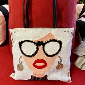 Canvas tote with sequin embellishments.